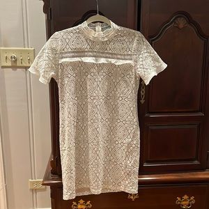 Karlie lace ecru with black stitching, high neck mini dress. Size small